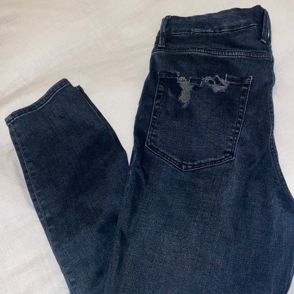 Good American distressed dark denim